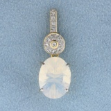 11ct Tw Milky White Quartz And White Sapphire Pendant In 14k Yellow Gold