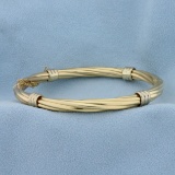 Italian-made Twisting Design Bangle Bracelet In 14k Yellow Gold