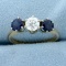 1.5ct Tw Three Stone Sapphire And Diamond Ring In 14k Yellow And White Gold