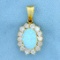Italian-made Lab Created Opal And Cz Pendant In 14k Yellow Gold
