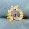Amethyst And Cz Flower Design Ring In 14k Yellow And White Gold