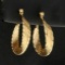 3d Twisting Design Hoop Earrings In 14k Yellow Gold