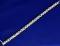 3 Ct Tw Diamond Tennis Bracelet With Baguette And Round Diamonds In 14k Yellow And White Gold