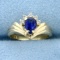 Pear Shaped Sapphire And Diamond Ring In 14k Yellow Gold