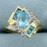 Sky Blue Topaz Bypass Ring In 10k Yellow Gold