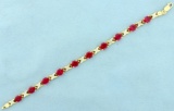 Lab Ruby And Diamond Gold Bracelet In 10k Yellow Gold