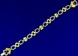 Italian Made Lucky Horseshoe And Heart Link Bracelet In 14k Yellow And White Gold