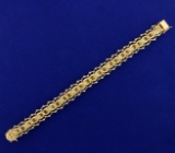Unique Woven Style Charm Bracelet In 14k Yellow Gold