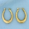 Oval Twisting Design Hoop Earring In 14k Yellow Gold