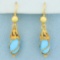 Persian Turquoise Dangle Earrings In 18k Yellow Gold