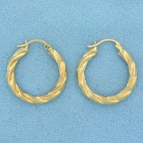 Twisting Hoop Earrings In 10k Yellow Gold