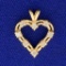 1/4ct Tw Diamond Heart Pendant In 14k Yellow Gold