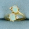 Opal And Dimond Ring In 14k Yellow Gold