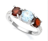 Classic Blue Topaz & Garnet 3-stone Ring In Sterling Silver