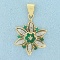 Vintage Emerald And Diamond Flower Pendant In 14k Yellow And White Gold