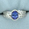 Aaa Quality Tanzanite And Diamond Ring In 18k White Gold
