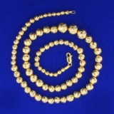Graduated Diamond Cut Bead Necklace In 14k Yellow Gold