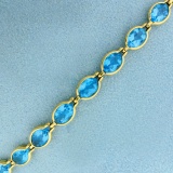 17ct Tw Swiss Blue Topaz Line Bracelet In 14k Yellow Gold
