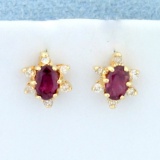 Ruby And Diamond Flower Design Earrings In 14k Yellow Gold