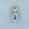 Tanzanite And Diamond Pendant In 14k Yellow Gold