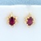 Ruby And Diamond Flower Design Earrings In 14k Yellow Gold