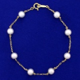 Mikimoto 7 Inch Akoya Pearl Station Bracelet In 18k Yellow Gold