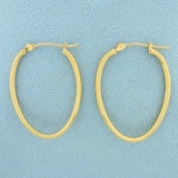 Oval Hoop Earrings In 14k Yellow Gold