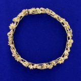 7 Inch Flower Design Bracelet In 14k Yellow Gold