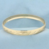 Diamond Cut Sparkle Bangle Bracelet In 10k Yellow Gold