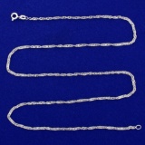 Italian Made 20 Inch Twisting Curb Link Chain Necklace In 14k White Gold