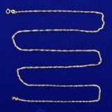24 Inch Twisting Curb Link Chain Necklace In 10k Yellow Gold