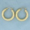 Diamond Cut Hoop Earrings In 14k Yellow Gold