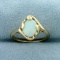 Natural Opal Solitaire Ring In 10k Yellow Gold