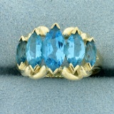 4ct Tw Five-stone Swiss Blue Topaz Ring In 10k Yellow Gold