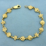 Seashell Sand Dollar Star Fish Sea Life Bracelet In 10k Yellow Gold