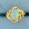 Opal Solitaire Ring In 14k Yellow Gold