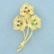 Vintage Dankner Emerald, Sapphire, Ruby, And Diamond Flower Pin In 18k Yellow Gold