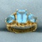 Swiss Blue Topaz Three-stone Ring In 14k Yellow Gold