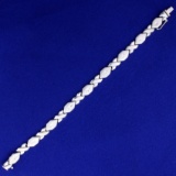 7 Inch X And O Designer Bracelet In 14k White Gold