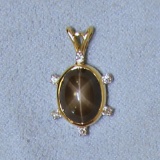 Gray Star Sapphire And Diamond Pendant In 14k Yellow Gold
