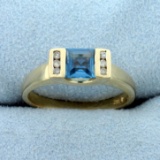 Swiss Blue Topaz And Diamond Ring In 10k Yellow Gold