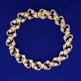 Floral Design Heart Link Bracelet In 14k Yellow, White, And Rose Gold