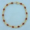 6.5ct Tw Garnet Link Bracelet In 14k Yellow Gold