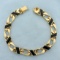 7 1/2 Inch Onyx Rectangle Curb Link Bracelet In 14k Yellow Gold