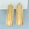 Diamond Cut Elongated Hoop Earrings In 14k Yellow Gold
