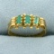 Antique Emerald Three Stone Baguette Ring In 14k Yellow Gold