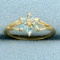 Sky Blue Topaz And Diamond Flower Design Ring In 10k Yellow Gold