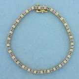 1.5ct Tw Tanzanite And Diamond Tennis Bracelet In 14k Yellow Gold