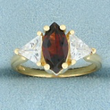 Garnet And Cz Three Stone Ring In 14k Yellow Gold