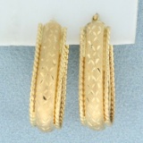 Diamond Cut Elongated Hoop Earrings In 14k Yellow Gold